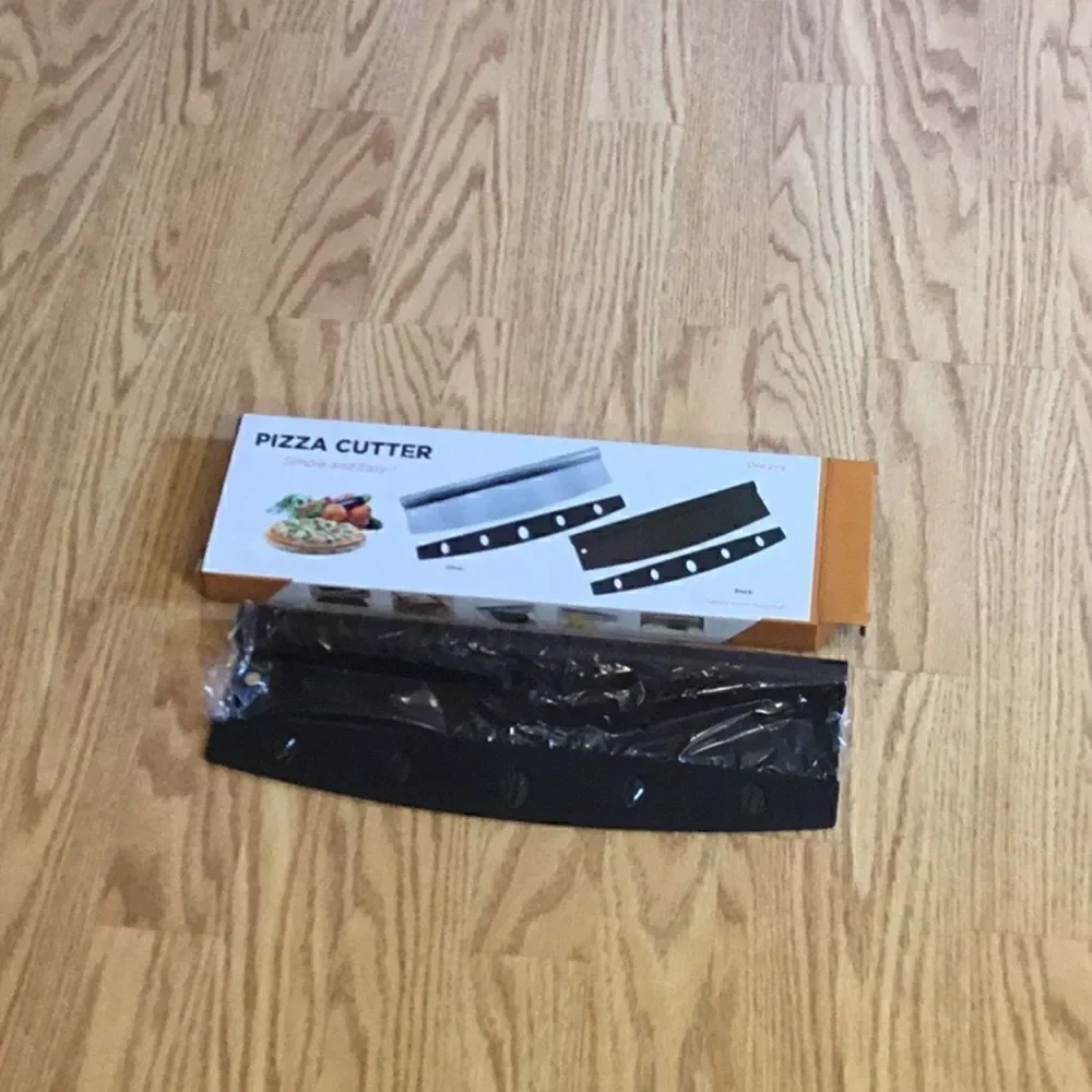 New stock, black pizza cutters with blade cover